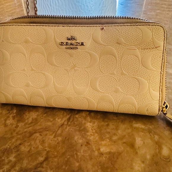 Coach Handbags - Coach Cream Women's Bag smudged.